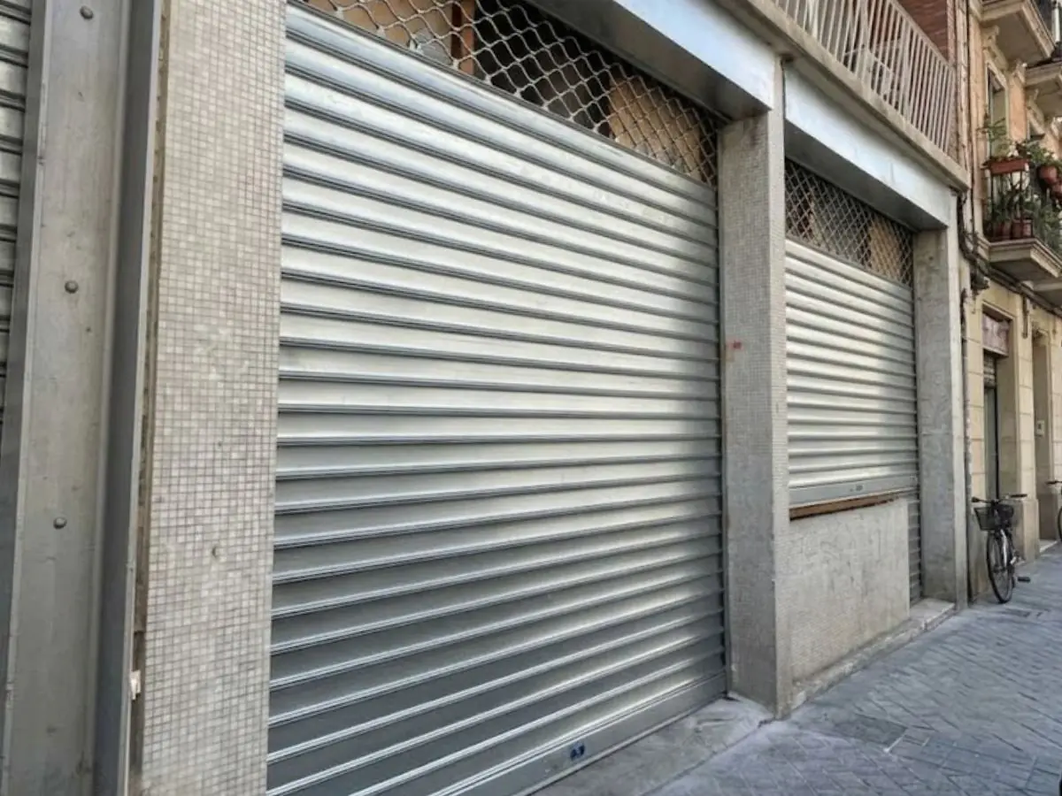 Remplacement tablier rideau métallique